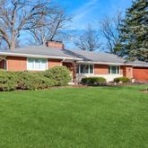 front view of a house and a yard