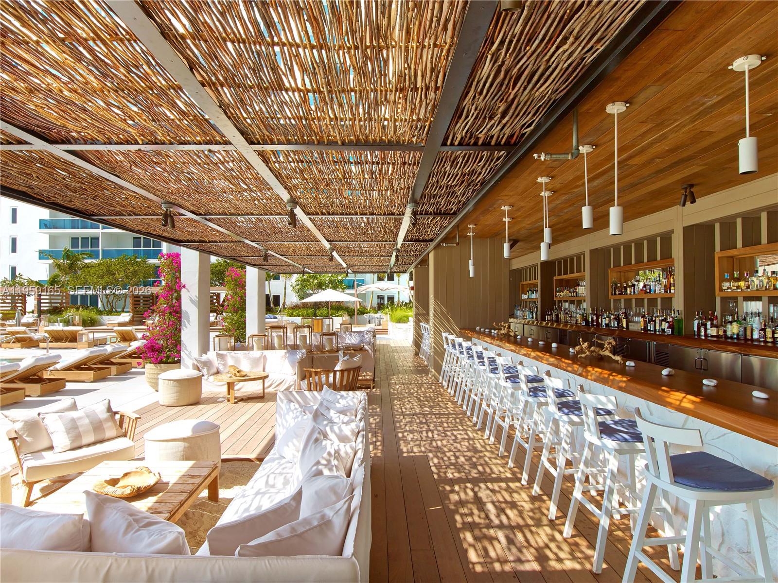 102 24th Street, Unit 1007 Miami Beach, FL 33139 - Photo 19 of 23 a view of a patio with a yard