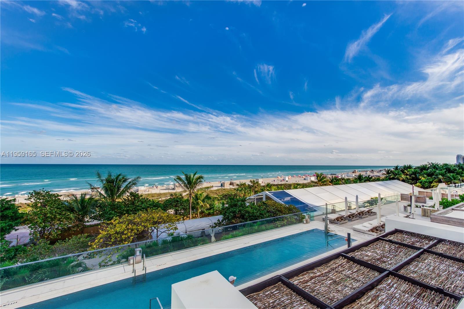 102 24th Street, Unit 1007 Miami Beach, FL 33139 - Photo 22 of 23 a view of an ocean from a balcony