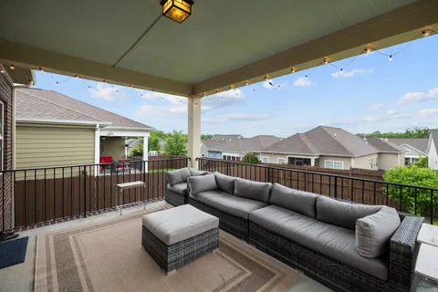 a bed room with a bed and a chandelier