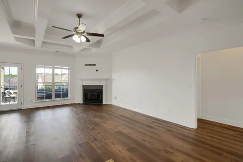 an aerial view of house with yard swimming pool and outdoor seating