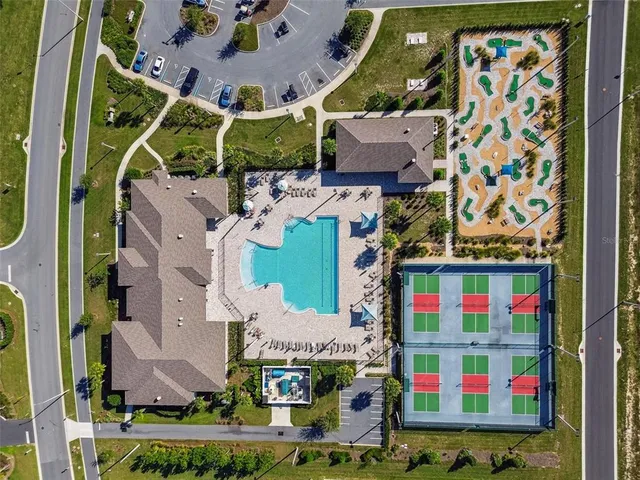 a view of a swimming pool and an ocean view
