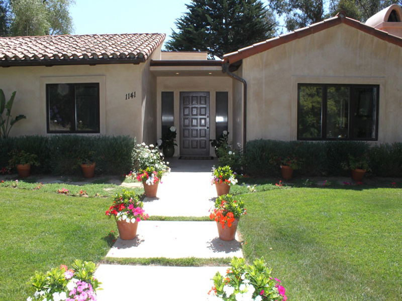 1141 Summit Road Montecito, CA 93108 - Photo 3 of 27 a front view of a house with a yard