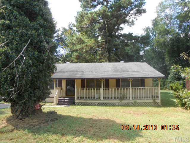 536 Dacian Road Raleigh, NC 27610 - Photo 1 of 10 a view of a house with a yard plants and large tree