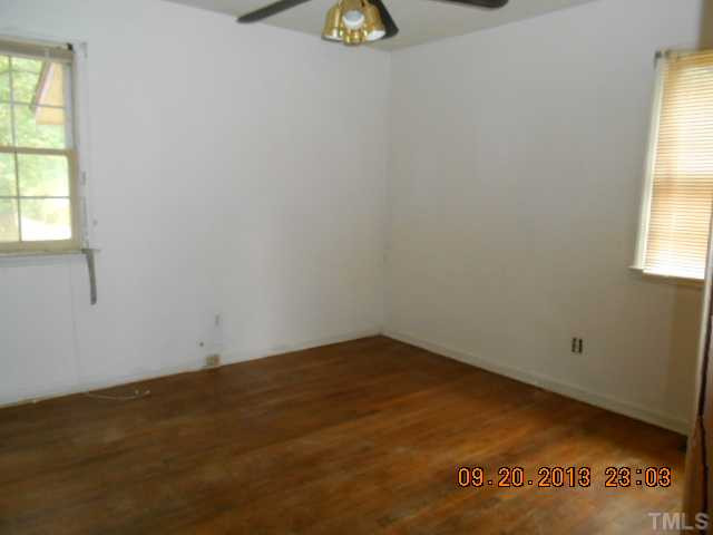 536 Dacian Road Raleigh, NC 27610 - Photo 8 of 10 an empty room with a window