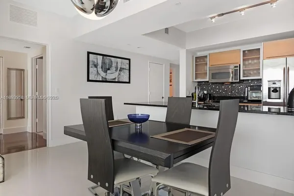 a view of a dining room with furniture