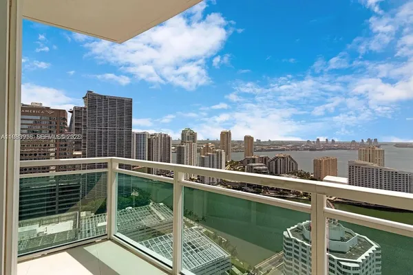 a view of a balcony with city view