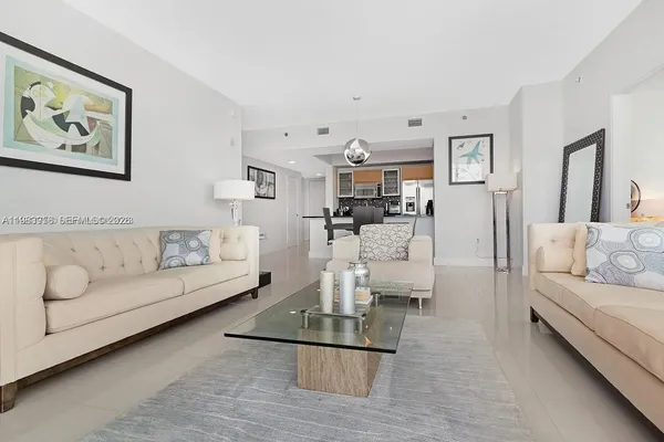a living room with furniture and a couch
