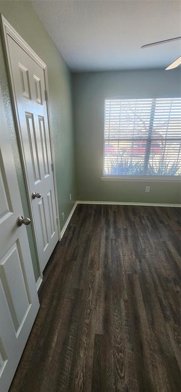 3709 Northpointe Drive Denton, TX 76207 - Photo 17 of 29 wooden floor in an empty room with a window