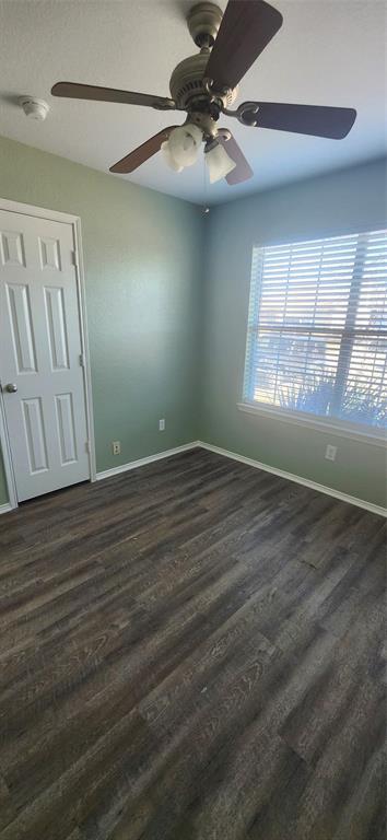 3709 Northpointe Drive Denton, TX 76207 - Photo 18 of 29 an empty room with wooden floor and windows