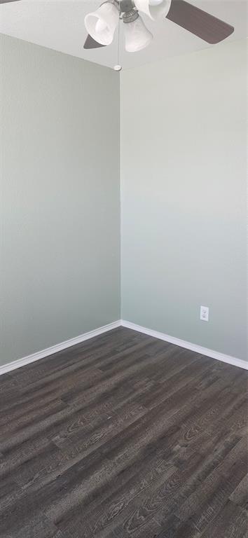 3709 Northpointe Drive Denton, TX 76207 - Photo 19 of 29 a view of an empty room with wooden floor