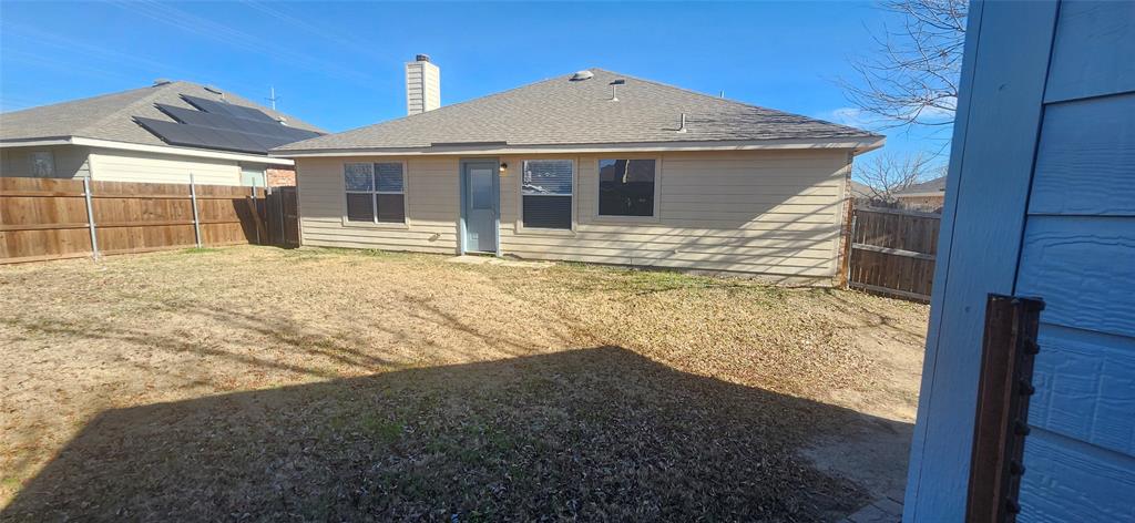 3709 Northpointe Drive Denton, TX 76207 - Photo 24 of 29 a view of a house with a yard