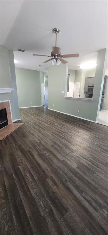 3709 Northpointe Drive Denton, TX 76207 - Photo 7 of 29 wooden floor in an empty room with a window