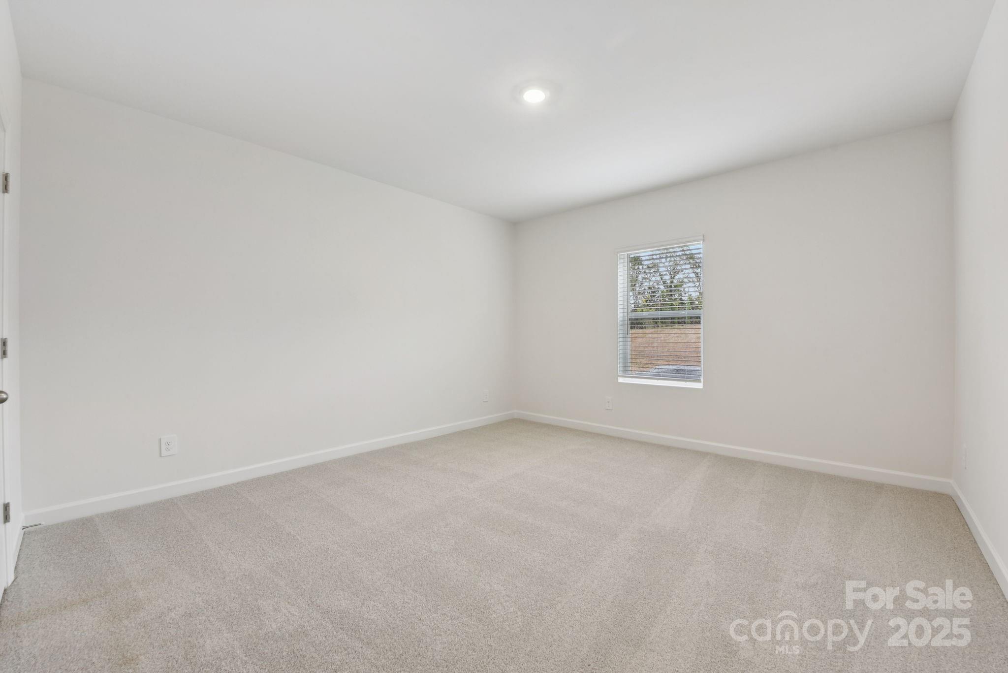 712 Palmer Pendleton Way York, SC 29745 - Photo 27 of 36 an empty room with a empty space and window