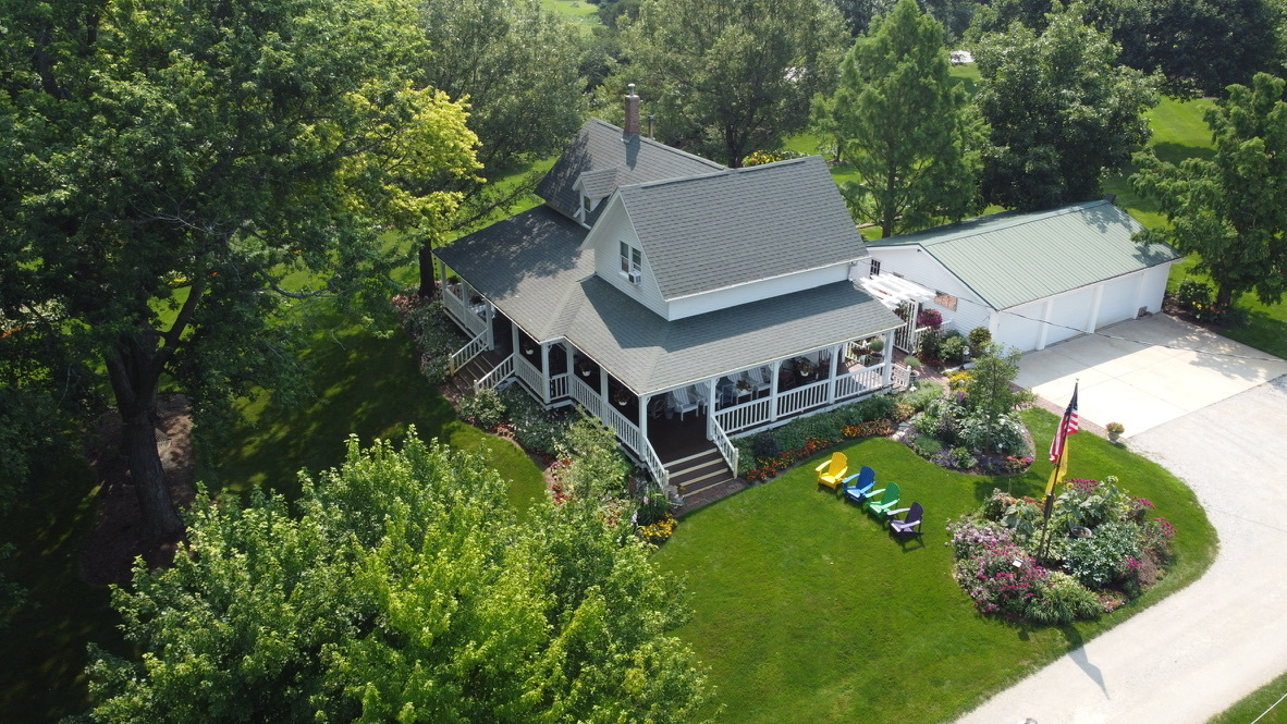 40W639 Russell Road Elgin, IL 60124 - Photo 2 of 59 aerial view of a house with a big yard and large trees