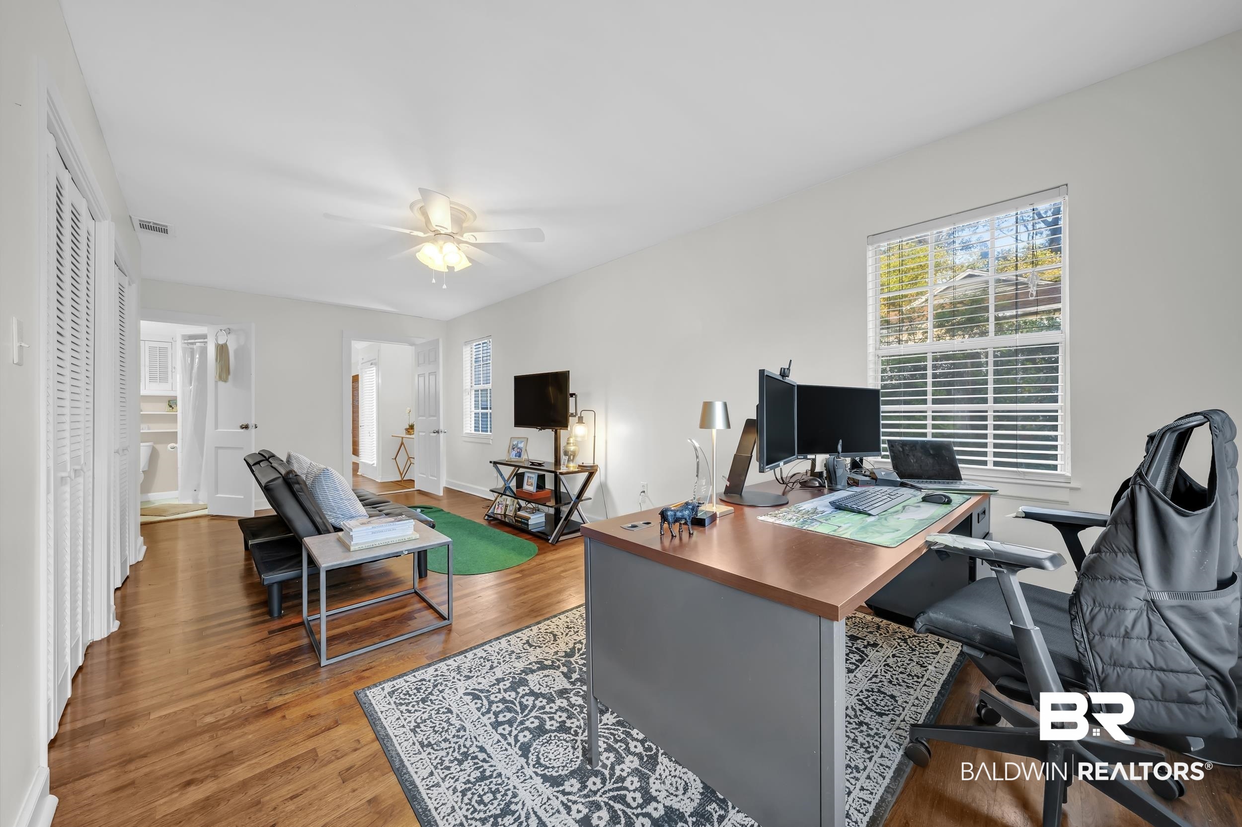 18 York Place Mobile, AL 36608 - Photo 13 of 27 Office featuring healthy amount of natural light, wood finished floors, and a ceiling fan