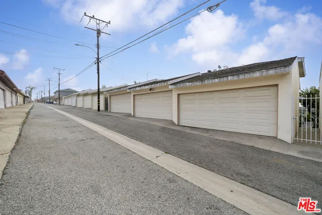 a view of a house with a street