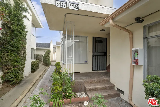 a view of a back yard of the house