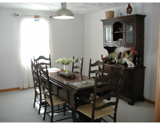 347 Boston Road Chelmsford, MA 01824 - Photo 11 of 11 a view of a dining room with furniture and chandelier