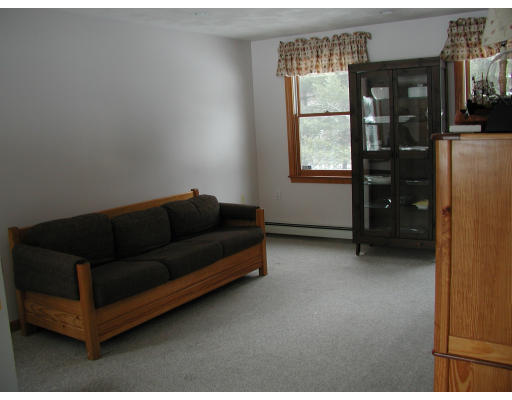 347 Boston Road Chelmsford, MA 01824 - Photo 2 of 11 a living room with furniture and a window