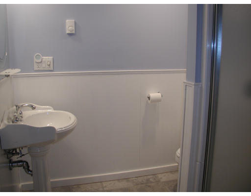347 Boston Road Chelmsford, MA 01824 - Photo 5 of 11 a bathroom with a sink and mirror