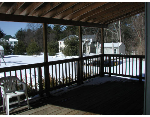 347 Boston Road Chelmsford, MA 01824 - Photo 10 of 11 a view of a two chairs in the porch