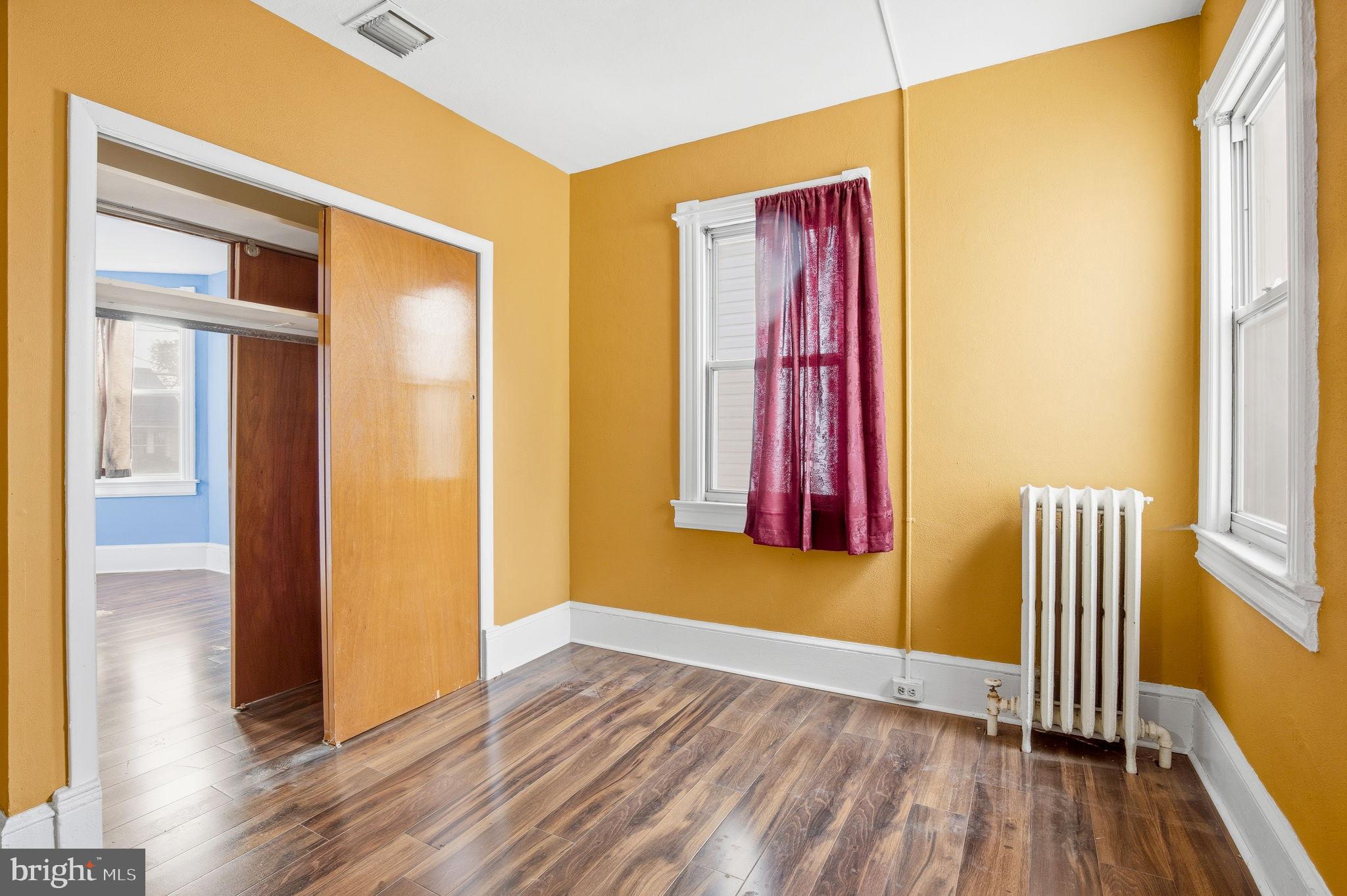 1346 Franklin Street Northeast Washington, DC 20017 - Photo 18 of 50 a view of a room with wooden floor and windows