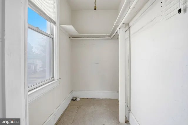 a view of hallway with front door