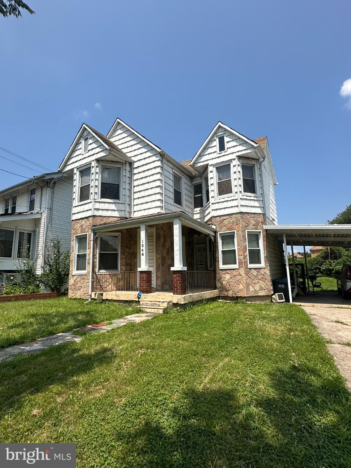 1346 Franklin Street Northeast Washington, DC 20017 - Photo 2 of 50 a front view of a house with a yard
