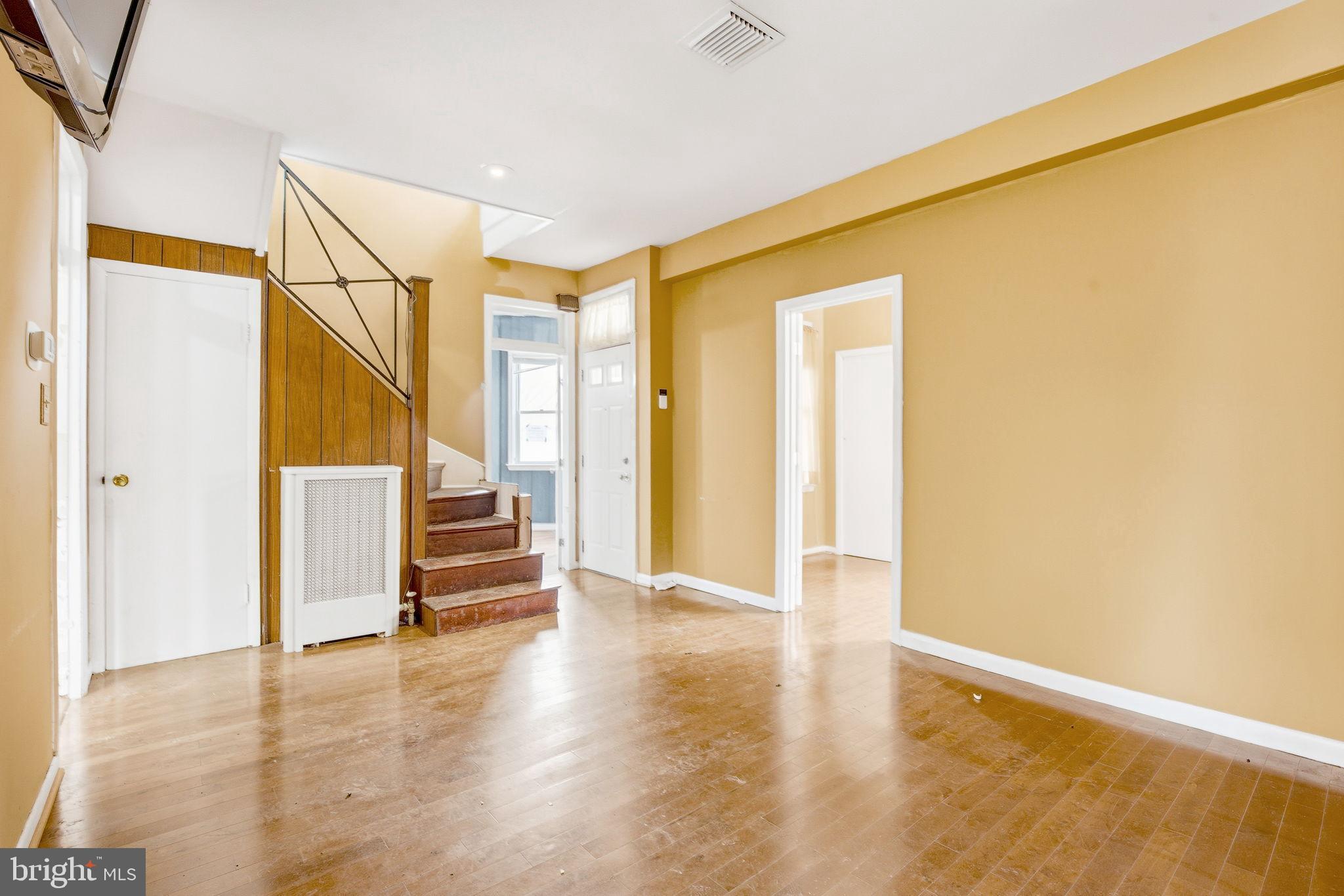1346 Franklin Street Northeast Washington, DC 20017 - Photo 3 of 50 a view of an empty room with stairs and ventilation
