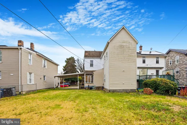 a view of a house with swimming pool