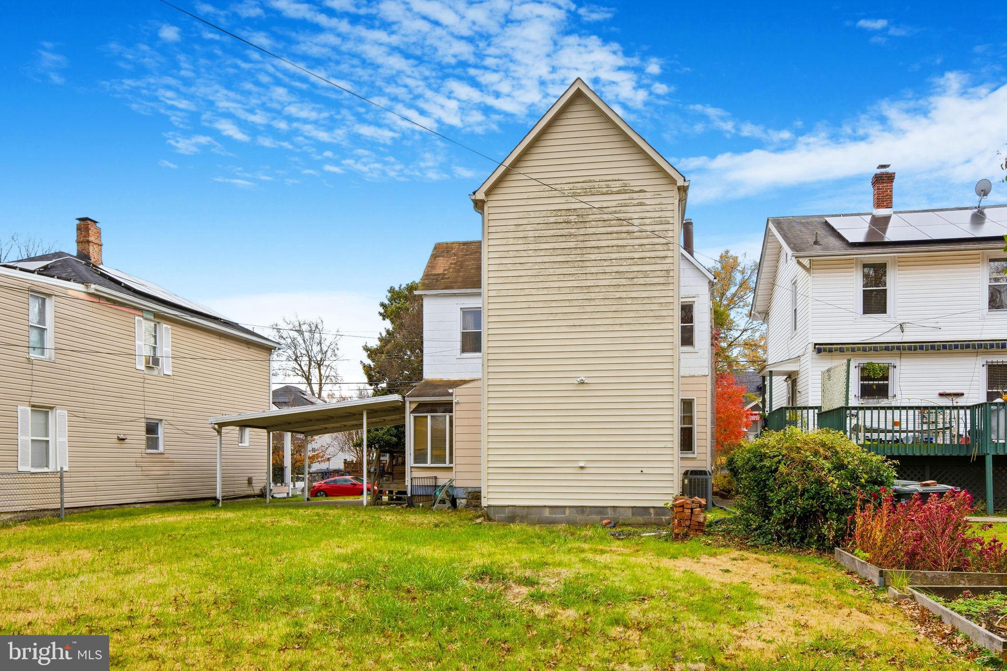 1346 Franklin Street Northeast Washington, DC 20017 - Photo 31 of 50 a view of a house with a yard