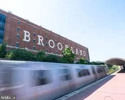 a view of a sign board with street