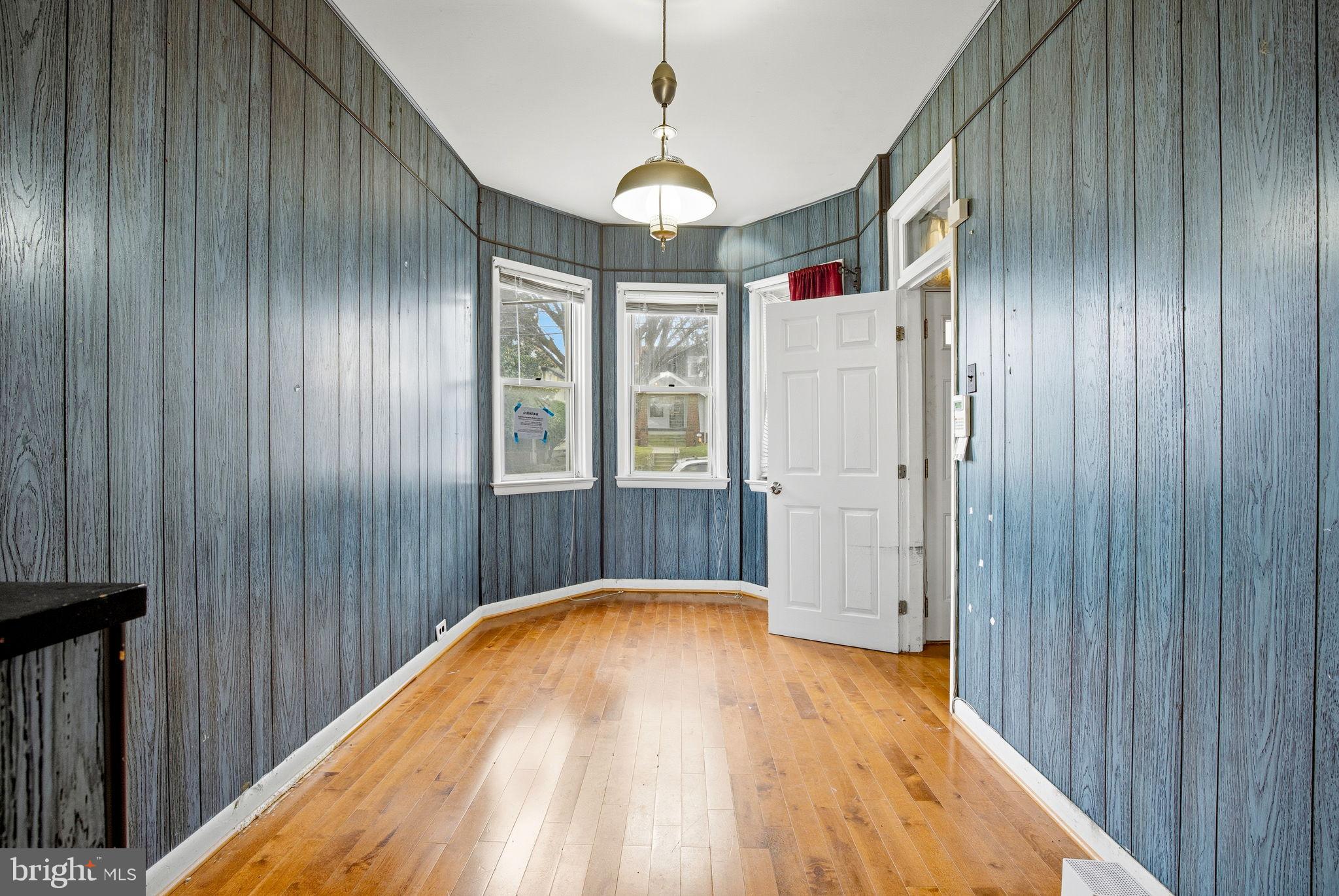 1346 Franklin Street Northeast Washington, DC 20017 - Photo 9 of 50 a view of empty room with wooden floor and fan