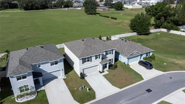 an aerial view of a house with a garden