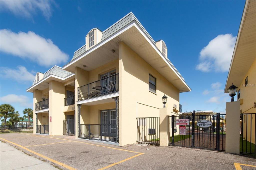 16333 Gulf Boulevard, Unit 201 Redington Beach, FL 33708 - Photo 1 of 39 a view of a house with a staircase
