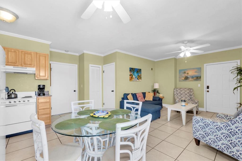16333 Gulf Boulevard, Unit 201 Redington Beach, FL 33708 - Photo 29 of 39 a living room with furniture and wooden floor