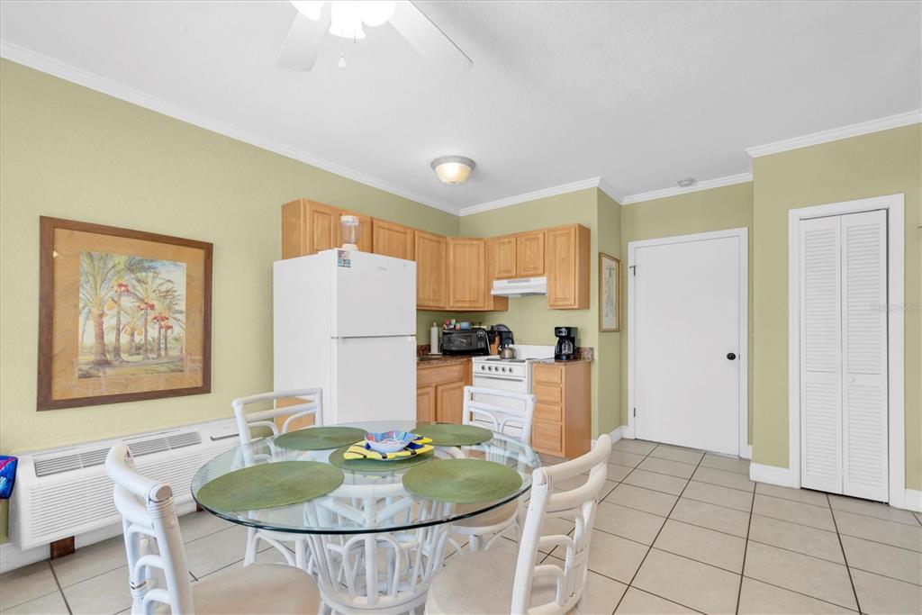 16333 Gulf Boulevard, Unit 201 Redington Beach, FL 33708 - Photo 30 of 39 a living room with furniture and a table