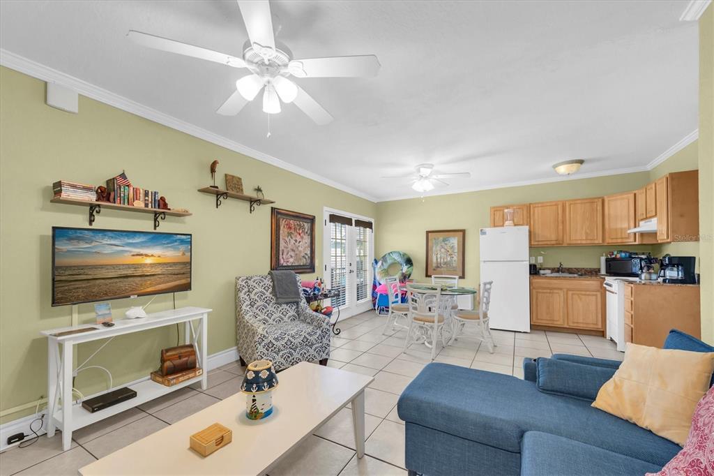 16333 Gulf Boulevard, Unit 201 Redington Beach, FL 33708 - Photo 34 of 39 a living room with furniture and a fireplace