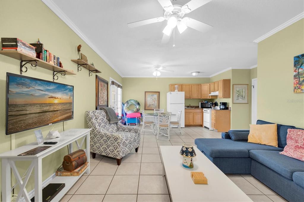 16333 Gulf Boulevard, Unit 201 Redington Beach, FL 33708 - Photo 35 of 39 a living room with furniture and kitchen view