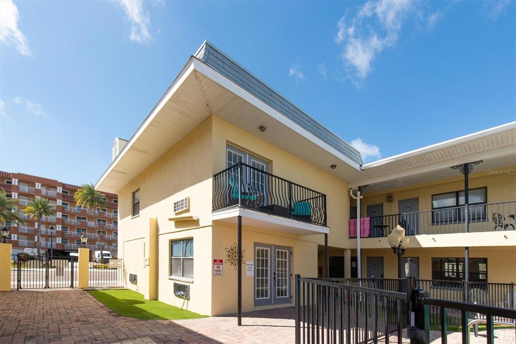 16333 Gulf Boulevard, Unit 201 Redington Beach, FL 33708 - Photo 37 of 39 a view of a building with a street