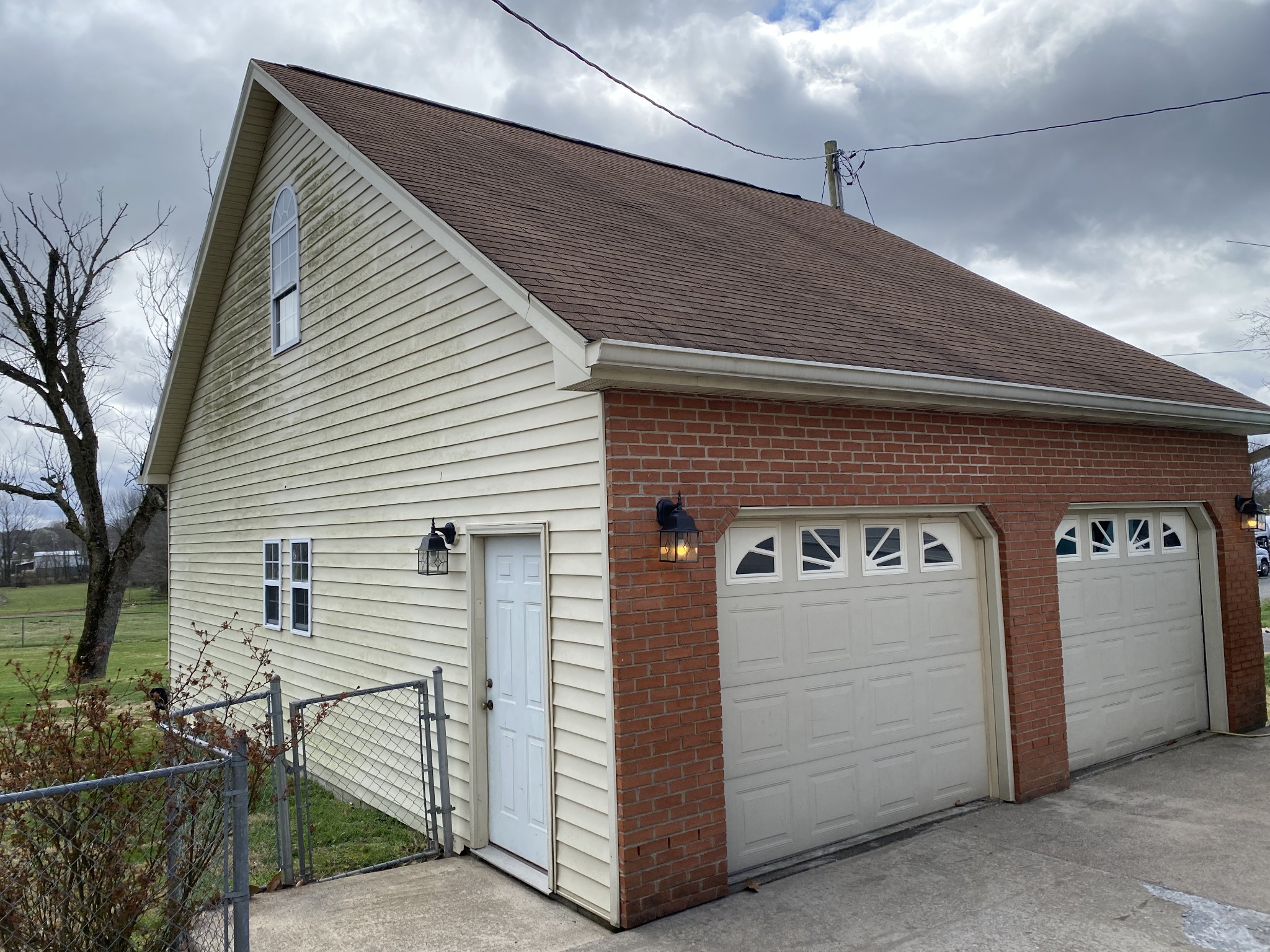 334 Jackson Road Portland, TN 37148 - Photo 15 of 15 a front view of a house with garage