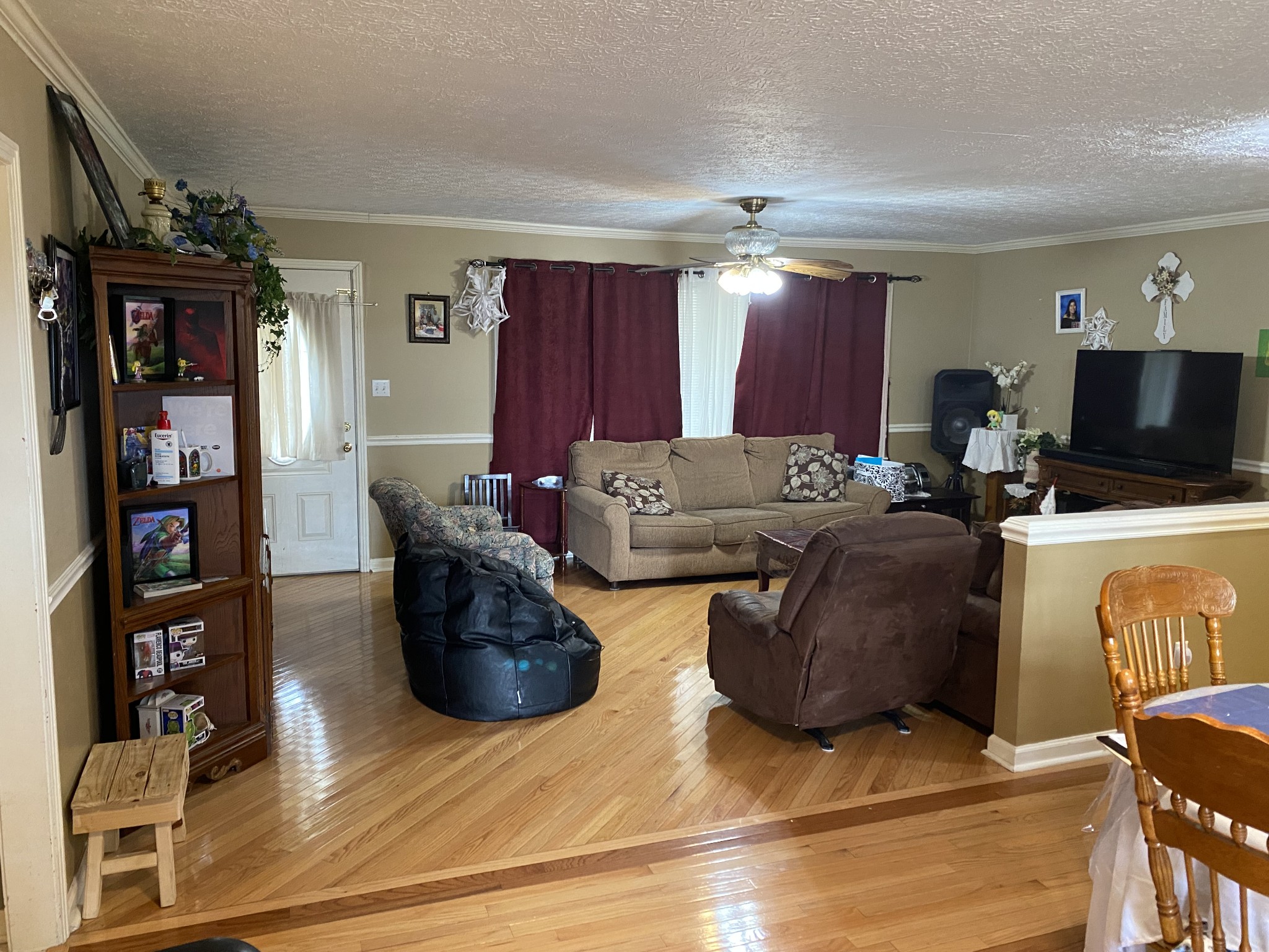 334 Jackson Road Portland, TN 37148 - Photo 3 of 15 a living room with furniture and a flat screen tv