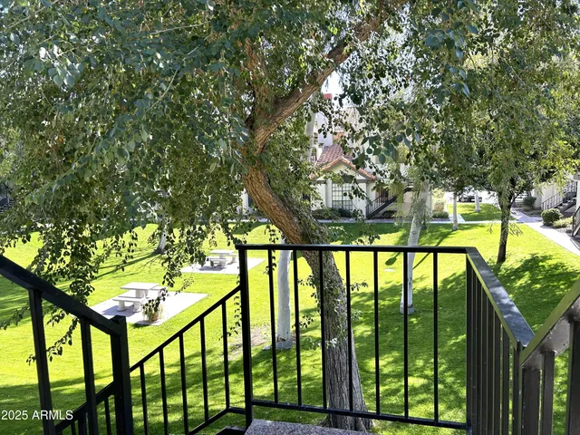 a view of staircase with mountain view