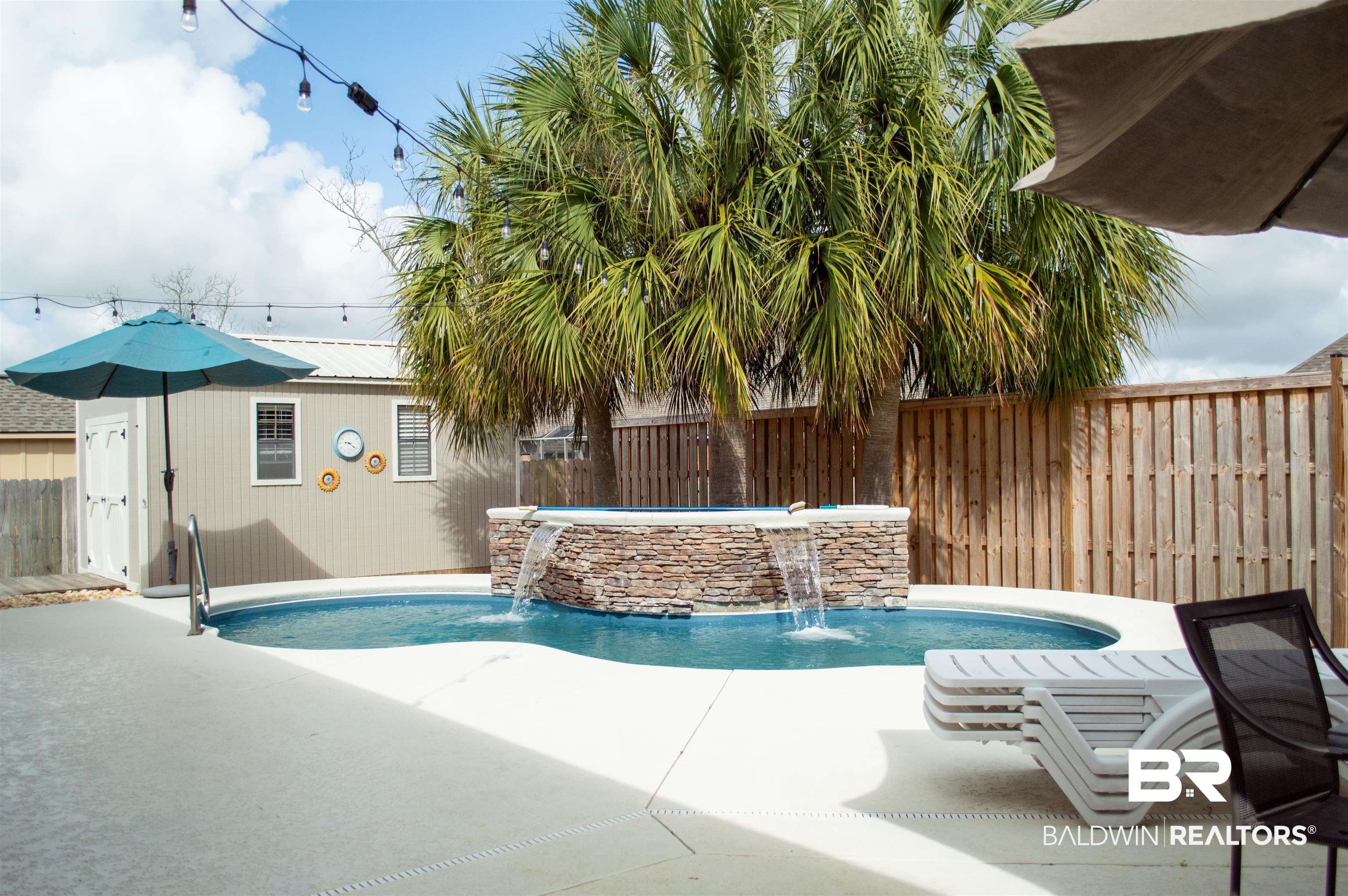 1124 West Orlando Drive Foley, AL 36535 - Photo 46 of 51 View of pool featuring patio surround and a fenced backyard