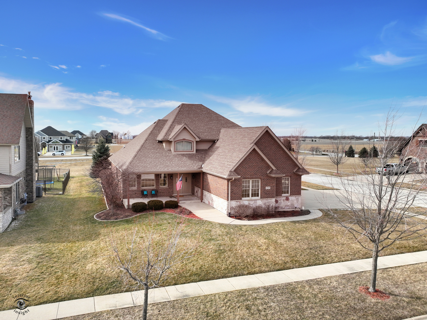 23928 Roberts Street Manhattan, IL 60442 - Photo 1 of 36 a front view of a house with a yard