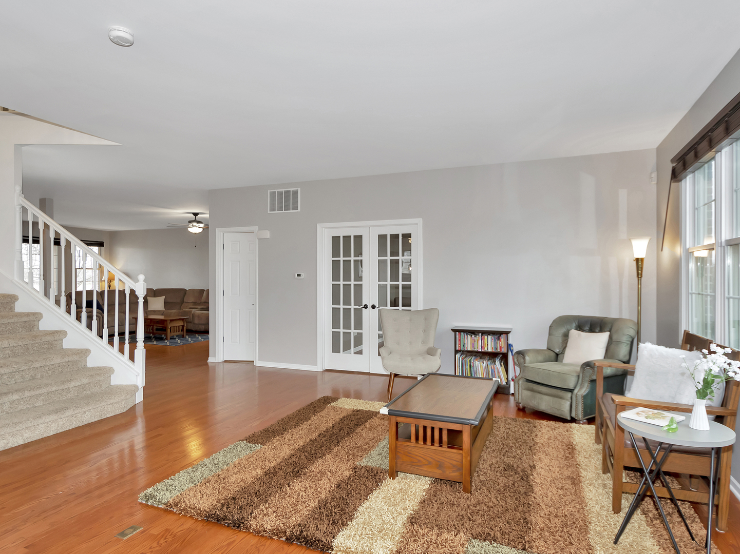 23928 Roberts Street Manhattan, IL 60442 - Photo 15 of 36 a living room with furniture and wooden floor