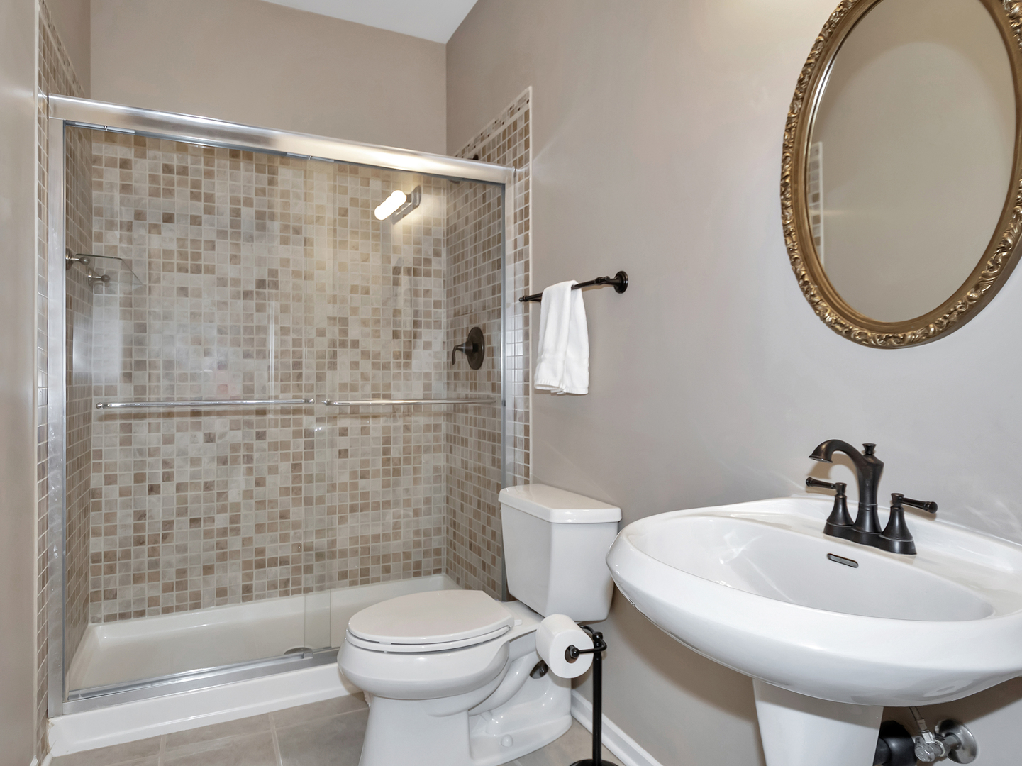 23928 Roberts Street Manhattan, IL 60442 - Photo 24 of 36 a bathroom with a sink a toilet and shower