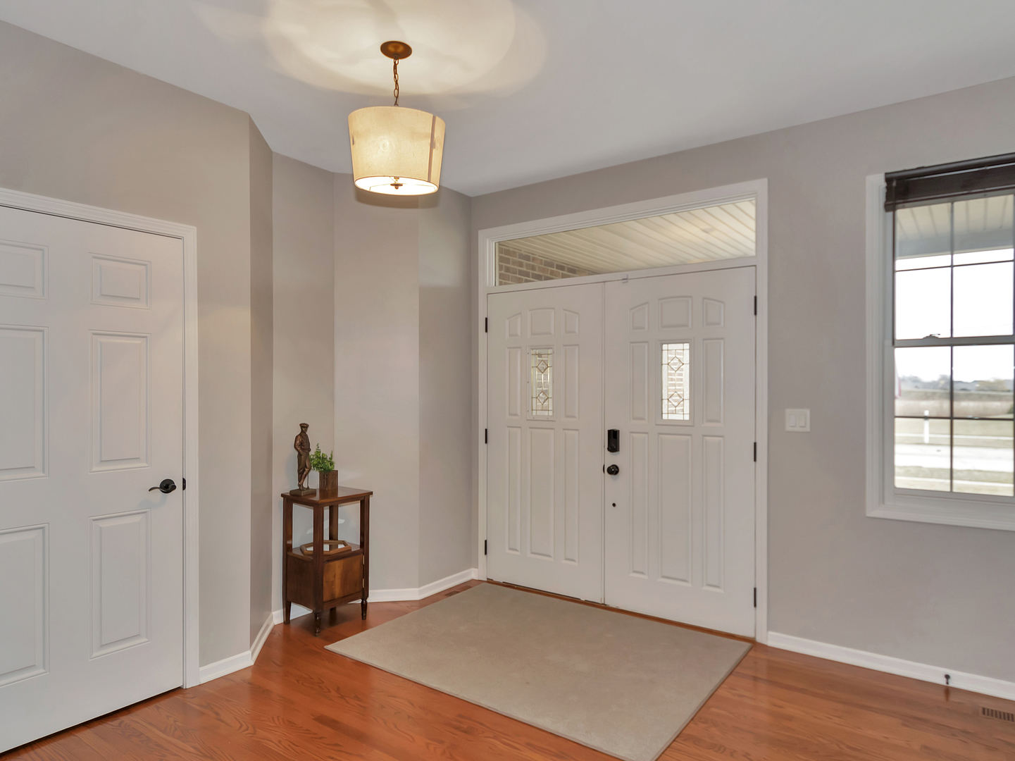 23928 Roberts Street Manhattan, IL 60442 - Photo 9 of 36 wooden floor in an empty room with a window