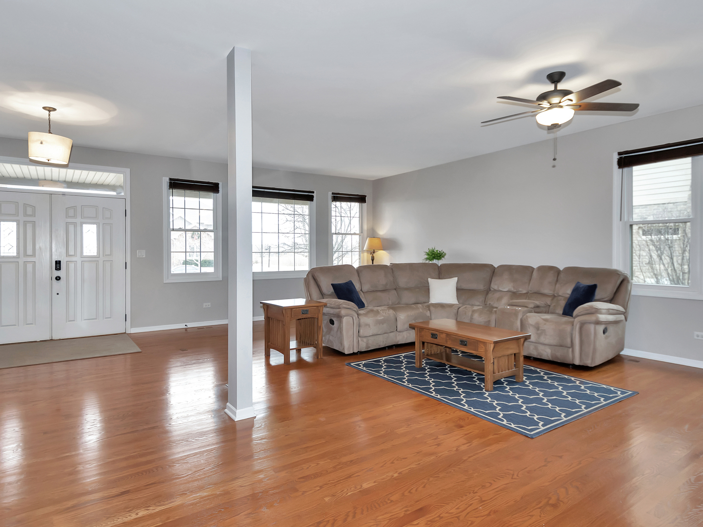 23928 Roberts Street Manhattan, IL 60442 - Photo 10 of 36 a living room with furniture and wooden floor